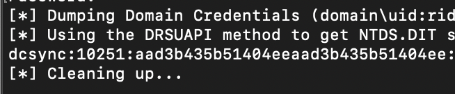 Terminal output shows Dumping Domain Credentials, followed by Cleaning Up...